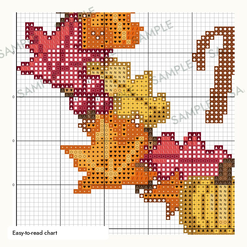 May include: A cross-stitch pattern chart featuring autumn leaves and a pumpkin, displayed on a grid with symbols. The design includes red, orange, and yellow foliage with a brown stem and a pumpkin base. The text 'Easy-to-read chart' is visible.