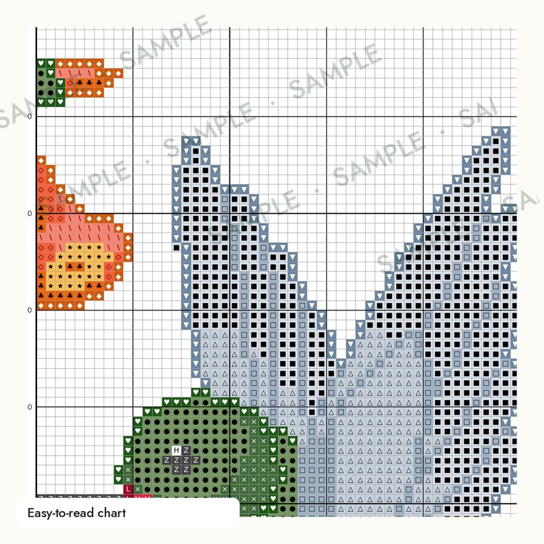May include: A cross-stitch pattern chart on a white grid background featuring a stylized bird design. The pattern uses various symbols like squares, triangles, and hearts to represent colors including orange, light blue, and dark green. Text reads Easy-to-read chart.