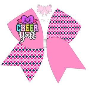 May include: Pink cheer bow with a white and navy blue checkered pattern. The bow has a pink bow in the center with the text "Bows with Attitude" and the text "Cheer Y'all" in colorful letters.
