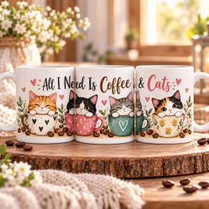 以下が含まれることがあります： カラフルなカップに入った子猫のイラストが描かれた3つの白いセラミック製マグカップ。All I Need Is Coffee & Catsという文字が書かれています。マグカップには小さなハート、花柄、表面に散らばったコーヒー豆が装飾されています。