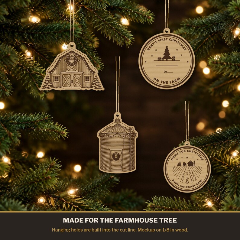 May include: Four light-coloured wooden Christmas ornaments hanging by strings. Designs include a barn, a grain silo, and two circular ornaments with text reading Baby's First Christmas On The Farm 20 and Home For Christmas Down The Gravel Road.