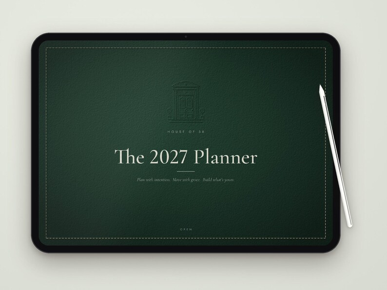 May include: A dark green digital planner displayed on a tablet screen with a white stylus. The cover features a line-art door icon, the text "HOUSE OF 58", "The 2027 Planner", the phrase "Plan with intention. Move with grace. Build what's yours.", and "OPEN".