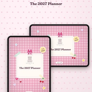May include: A digital planner displayed on two tablet screens with a pink gingham background. The cover features a white scalloped label with the text The 2027 Planner, a pink bow, cherry icons, stars, hearts, and a small button labeled open me.