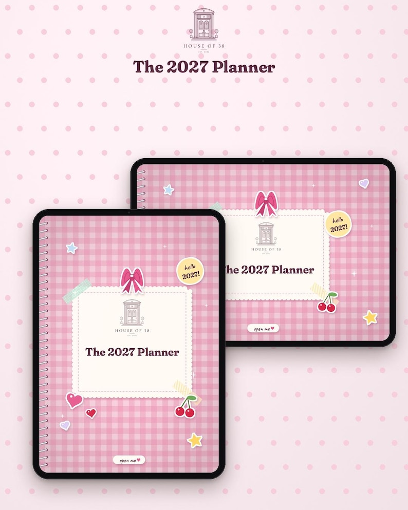 May include: A digital planner displayed on two tablet screens with a pink gingham background. The cover features a white scalloped label with the text The 2027 Planner, a pink bow, cherry icons, stars, hearts, and a small button labeled open me.