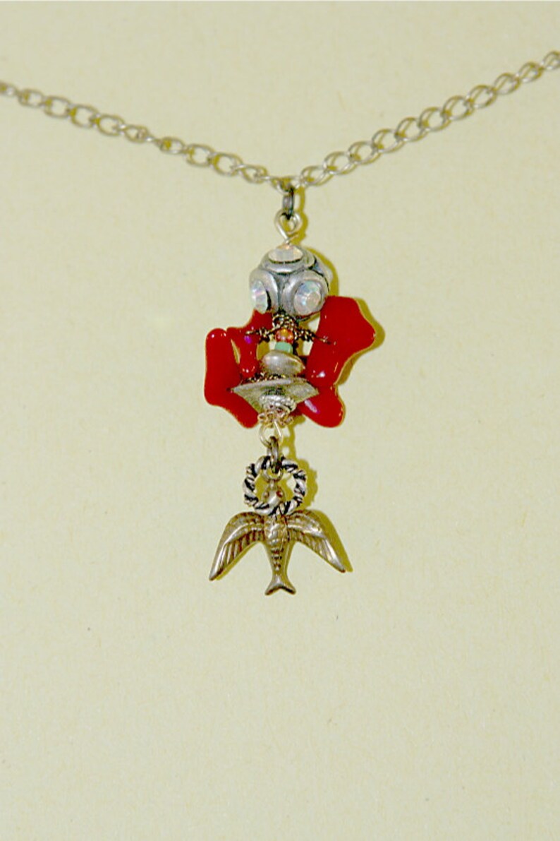 Red necklace with little birds  