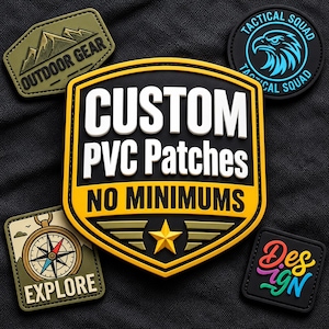 May include: A collection of five PVC patches. The central shield-shaped patch is black and yellow with the white text CUSTOM PVC Patches and NO MINIMUMS. Other patches feature an eagle, a compass with EXPLORE, and the word Design.