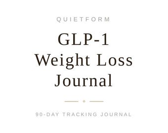May include: A white journal cover with dark text reading QUIETFORM, GLP-1 Weight Loss Journal, and 90-DAY TRACKING JOURNAL. The design features a small diamond icon between two horizontal lines above the tracking journal text.