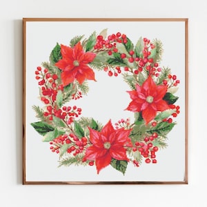 May include: A Christmas wreath with red poinsettia flowers, green leaves, and red berries.