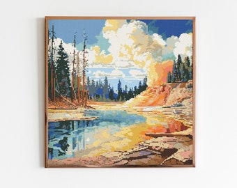 May include: A framed cross-stitch artwork depicting a colourful landscape with a river, trees, and a rocky cliff. The sky is blue with white clouds. The colours are vibrant and the scene is peaceful.