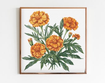 May include: A cross-stitch embroidery of a bouquet of orange marigolds with green leaves against a white background.