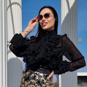 Ladies black frilly blouse hot sale