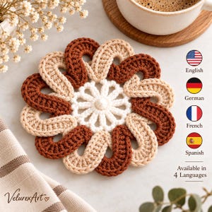 May include: A round crochet coaster featuring a central white flower-like motif surrounded by alternating interlocking loops in shades of dark brown and beige. The textile design creates a circular pattern with a textured, yarn-based construction.