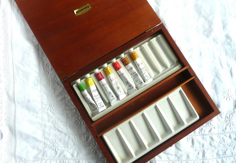 Vintage paint box with watercolour paints and ceramic palette Rowney