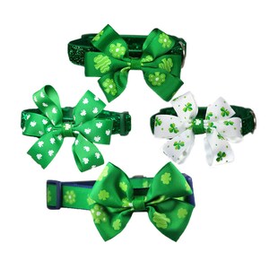 May include: Four different green and white dog collars with shamrock print and bow ties. The collars are decorated with green glitter and shamrock print.