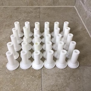 Crafters’ Delight: Set of 30 Empty Plastic Thread Spools for DIY Projects