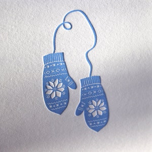 Ein Paar Handschuhe im Letterpress-Kartenset