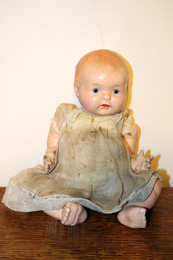 Scary Creepy Doll Head With Loose Eyes