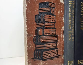 Stacked Books Design on Engraved Brick Bookend Shelf Décor