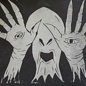 May include: A black and white linocut print of a creature with three eyes and a large mouth. The creature has long, thin fingers on each hand.