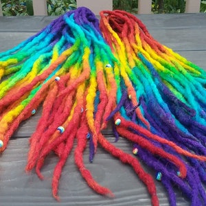 DE made to order Rainbow wool dreads approx 36 inches from tip to tip (18 inches when folded in half) and are made to order
