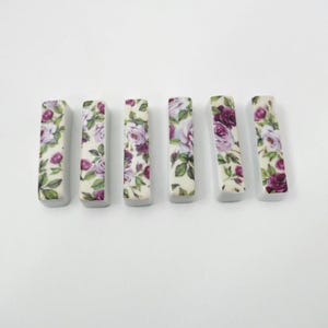 Antique pink knife holders