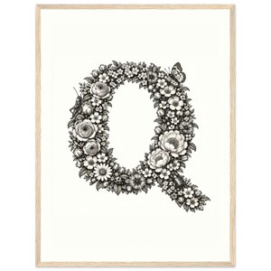 May include: A framed black and white botanical illustration of the letter Q, composed of various flowers, leaves, a butterfly, a grasshopper, and a ladybug. The artwork is presented in a light-colored wooden frame against a white background.