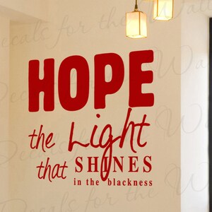 May include: Red vinyl wall decal with the text "HOPE the light that SHINES in the blackness".