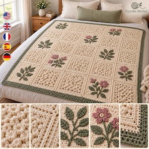 May include: A cream-coloured crochet blanket featuring a grid of square panels with alternating textured patterns and floral motifs in dusty pink and sage green, finished with a dark green border. The brand name Tayyaba Stitches is visible.