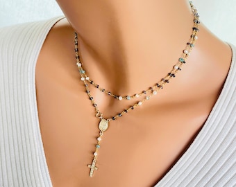 Collar inspirado en un rosario relleno de oro, con tanzanita, perla y topacio, envoltura milagrosa.