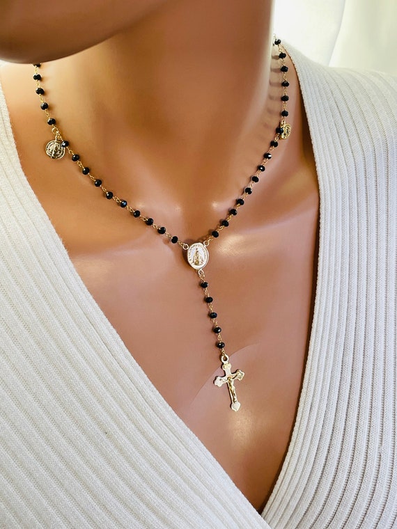 Gold charmed rosary black rosary necklace. Gold filled rosary Crucifix miraculous evil eye Hamsa Benedict Guadalupe protection necklace