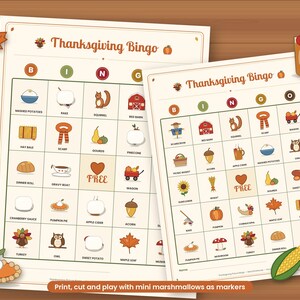 May include: Two Thanksgiving Bingo game cards featuring a grid of seasonal icons including a turkey, pumpkin pie, red barn, squirrel, and maple leaf. The cards have the text Thanksgiving Bingo at the top and a free space in the centre.