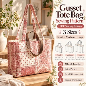 May include: A quilted tote bag with a red and white paisley pattern, featuring two long shoulder straps and two shorter brown handles. The text reads Gusset Tote Bag Sewing Pattern, 3 Sizes, Small 13"x10"x4", Medium 15"x12"x4.5", Large 16"x13"x5".