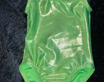 May include: A bright green leotard with a shiny, metallic finish. The leotard has a scoop neck and sleeveless design.