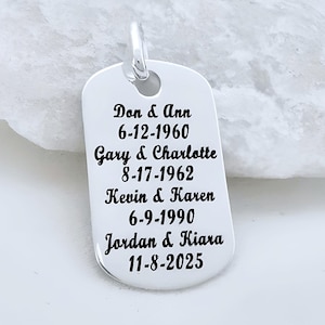 May include: A silver dog tag pendant with engraved names and dates. The text includes names like "Don & Ann" and "Gary & Charlotte," along with dates such as "6-12-1960" and "11-8-2025." The pendant has a loop at the top for a chain.
