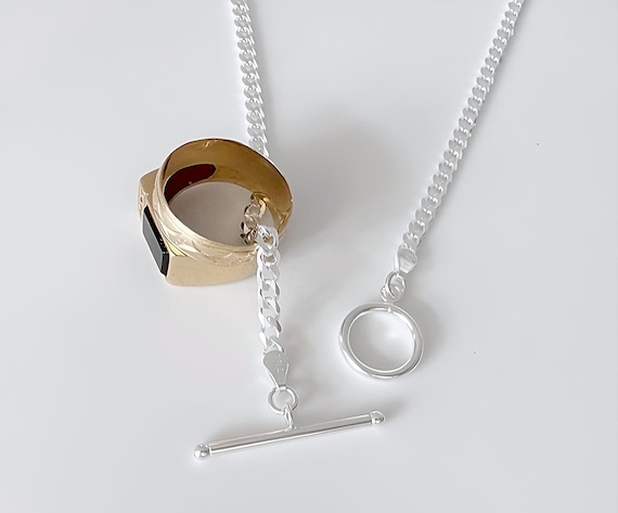 スターリングシルバーのメンズリングホルダージュエリー。直径14mm x 