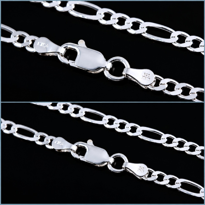May include: A polished sterling silver Figaro chain necklace featuring a lobster claw clasp. The metal links are stamped with 925 and ITALY. The chain consists of a repeating pattern of three small circular links followed by one elongated oval link.