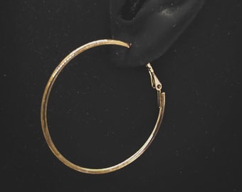 Vintage large simple round hoop pierced earrings : dark gold tone metal ; about 1 3/4 inches long