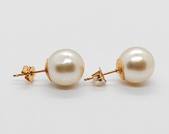 Vintage faux pearl ball pierced earrings : minimalist white with gold tone hardware ; about 3/8 in. diameter