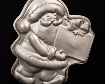 Amscan Santa Claus Holding Present Gift Box Metal Cake Pan Christmas Holiday Fun Party