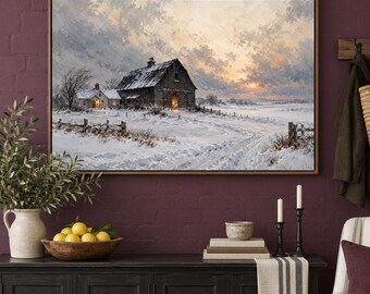 May include: A framed landscape painting depicting a snow-covered rural scene with a large dark barn and a smaller house under a cloudy sunset sky. The painting features a winding path through the snow, a wooden fence, and soft golden light.