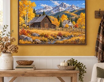 May include: A framed landscape painting depicting a rustic wooden barn and a white house nestled in a valley with golden autumn trees, a flowing stream, and snow-capped mountain peaks under a bright blue sky with scattered white clouds.
