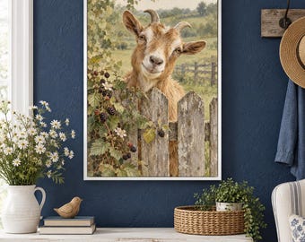 May include: A framed wall art print featuring a brown goat peering over a weathered wooden fence. The scene includes a blackberry bush with dark berries and white flowers in the foreground, set against a soft, muted green rural landscape.