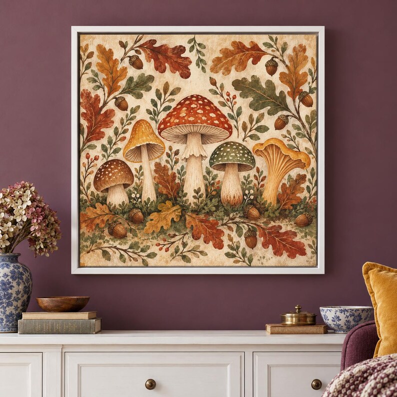 May include: A square wall art print featuring a detailed illustration of various mushrooms, including a large red-capped specimen, surrounded by autumn-colored oak leaves, small green sprigs, and brown acorns on a light beige background.