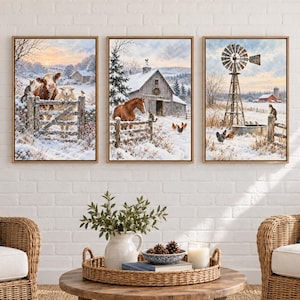 May include: A set of three framed wall art prints depicting winter farm scenes. The first shows a cow and sheep by a gate, the second a horse near a barn, and the third a windmill with chickens in a snowy landscape with light wood frames.