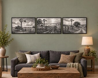 May include: A set of three black and white landscape wall art prints featuring rural scenes with windmills, wooden fences, and dirt paths, each enclosed in a thin black frame and displayed horizontally in a row on a wall.