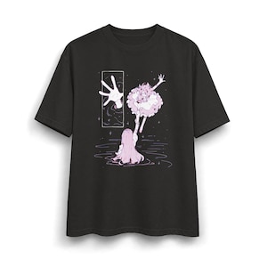 May include: A black short-sleeve t-shirt featuring a graphic illustration of two figures in light pink and white. One figure reaches out from a rectangular frame while the other figure, submerged in water, reaches upward to grasp the first figure's hand.