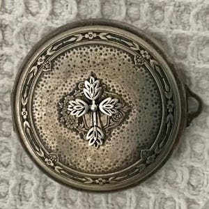 Virgin Mary pocket shrine- silver color