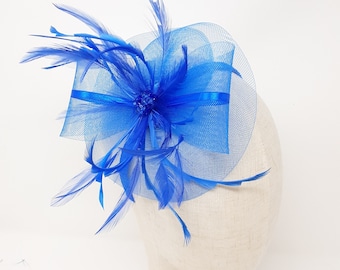 Royal blue fascinator attached to clip, comb and Alice band
