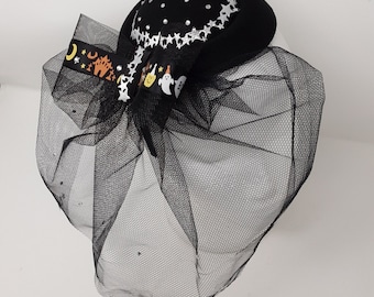 Halloween black veiled percher fascinator with stars and diamante.