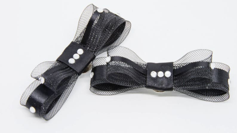 Black and sparkling diamant\u00e8 shoe clips